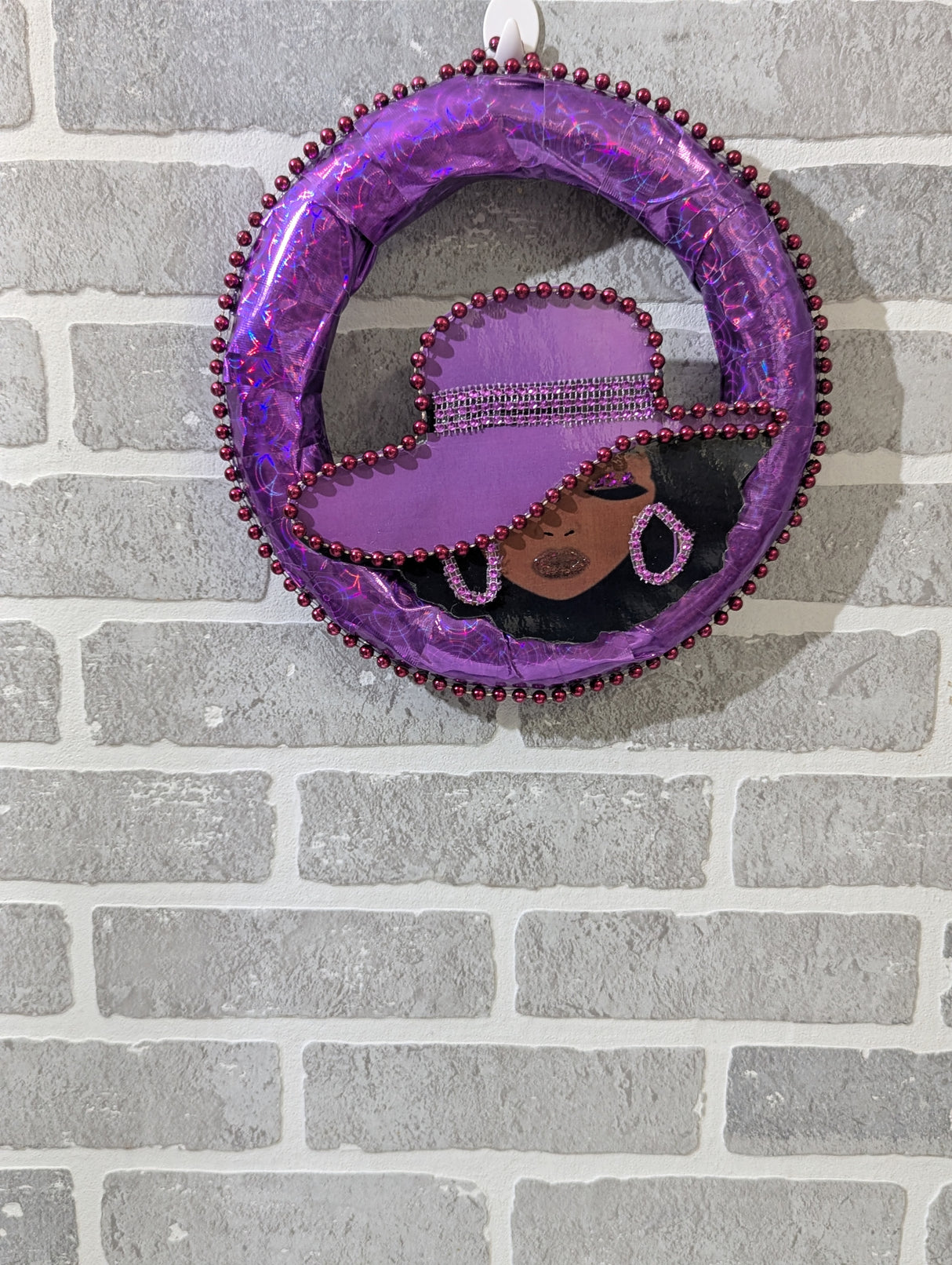 Custom Lady Purple Wreath hang in the wall