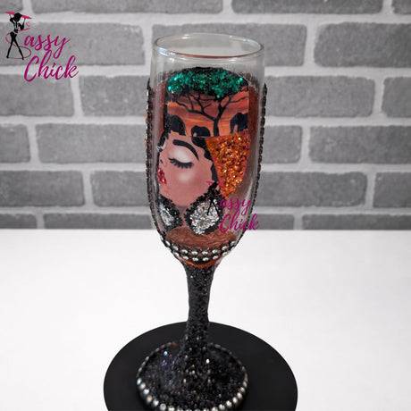 Personalized orange wine flute with glitter and rhinestones, customized champagne glass for weddings and birthdays.