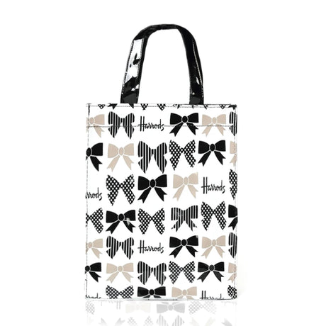 white bag black strap, ribbon printed design 