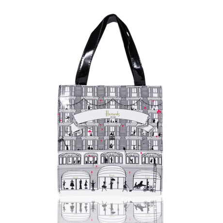 silver bag black strap tote bag