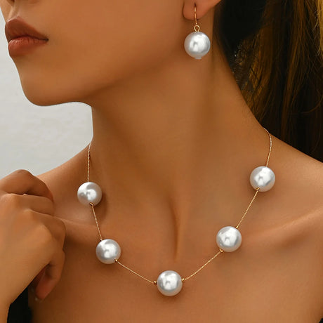 Model using Elegant Acrylic Pearl Earrings & Necklace Set