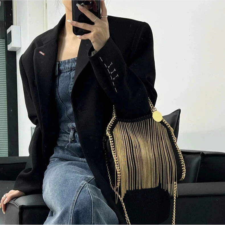 black gold tassel handbag