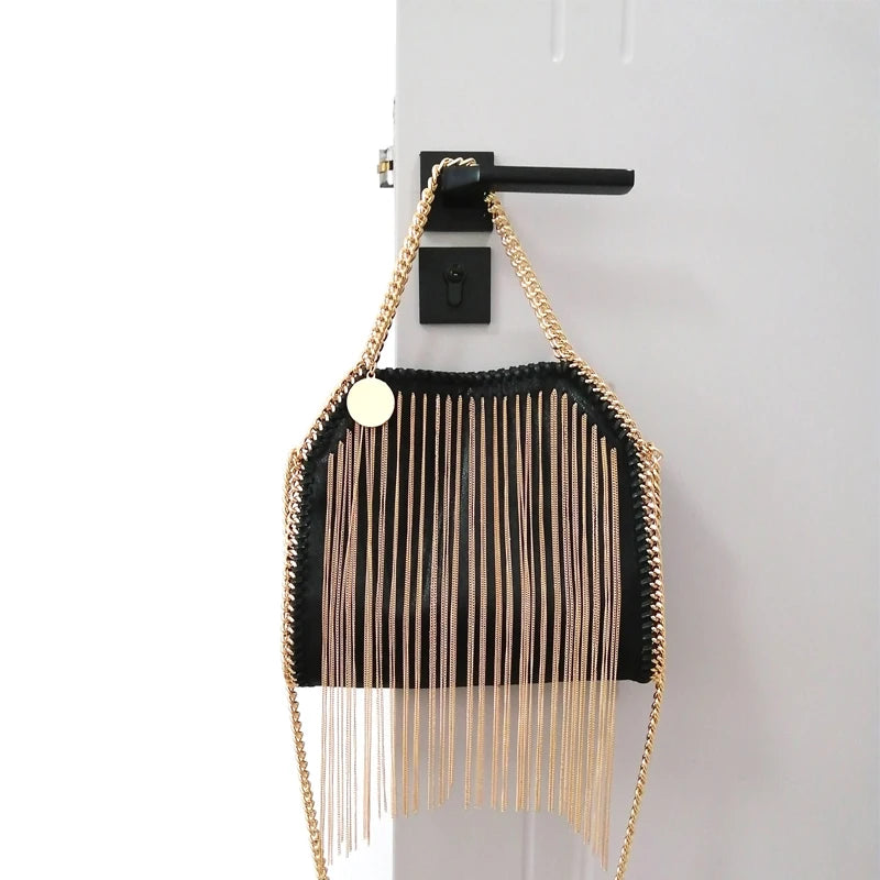 black gold tassel handbag