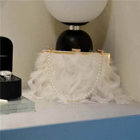 white feather handbag