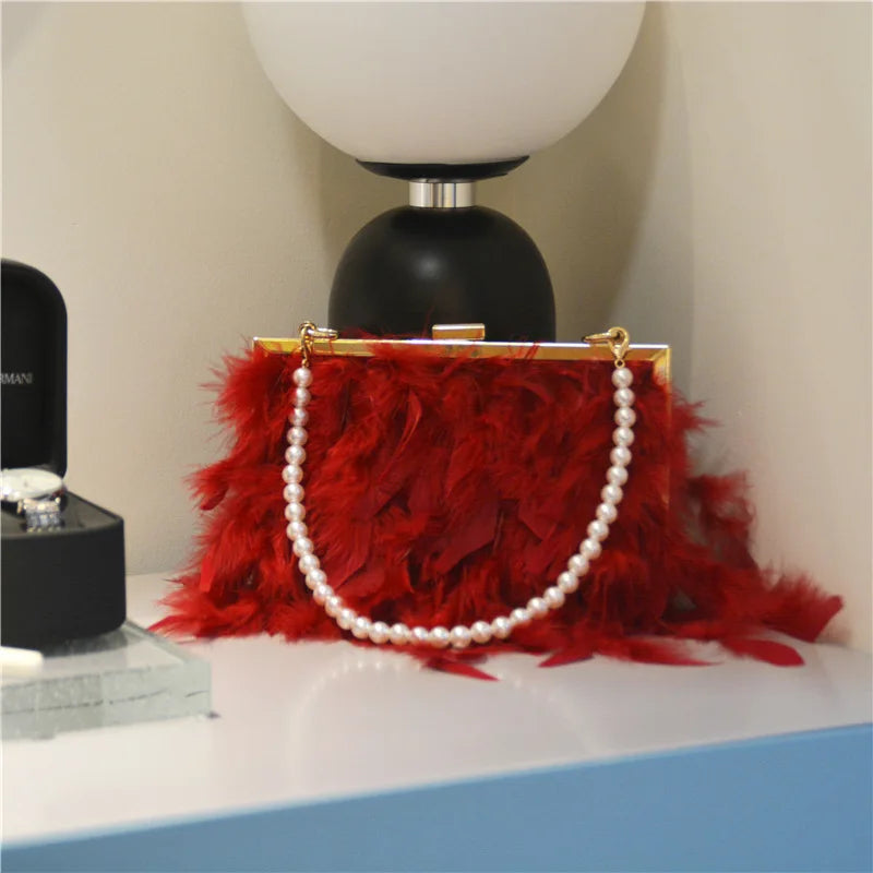 red feather handbag