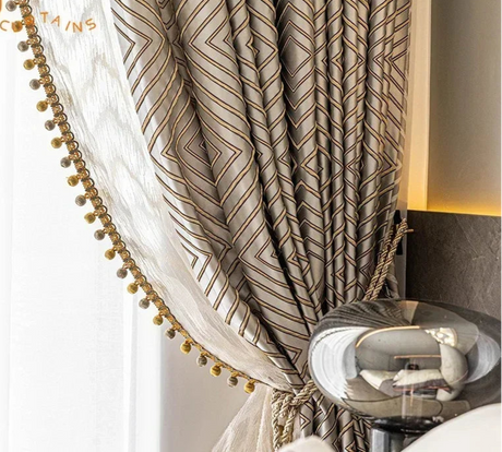 Gray diamond jacquard blackout curtains hanging in a modern living room