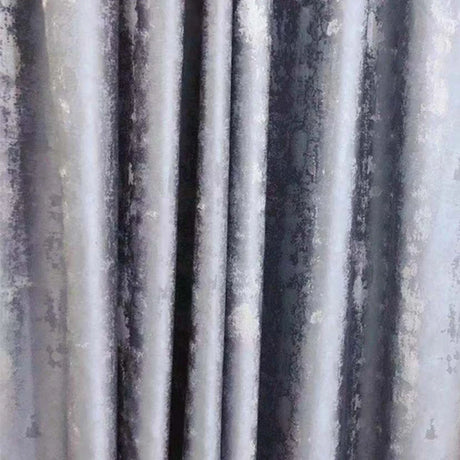 Silver jacquard luxury blackout curtains hanging in a modern living room