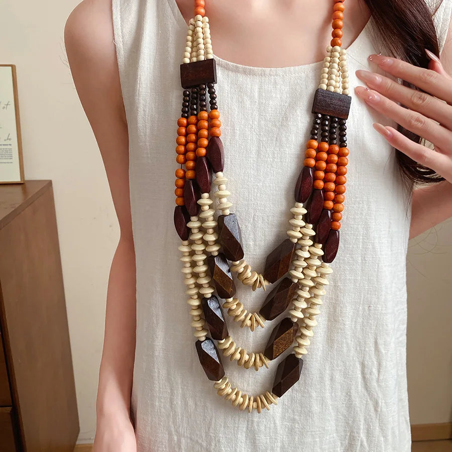 Model Using Handmade Multi Layer Round Wooden Beaded Necklaces 