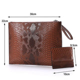 brown python size handbag