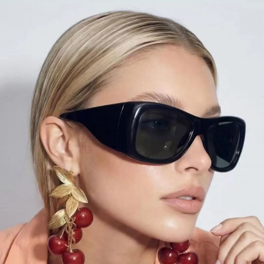 Model Using Large-Frame High-End Fashion Sunglasses