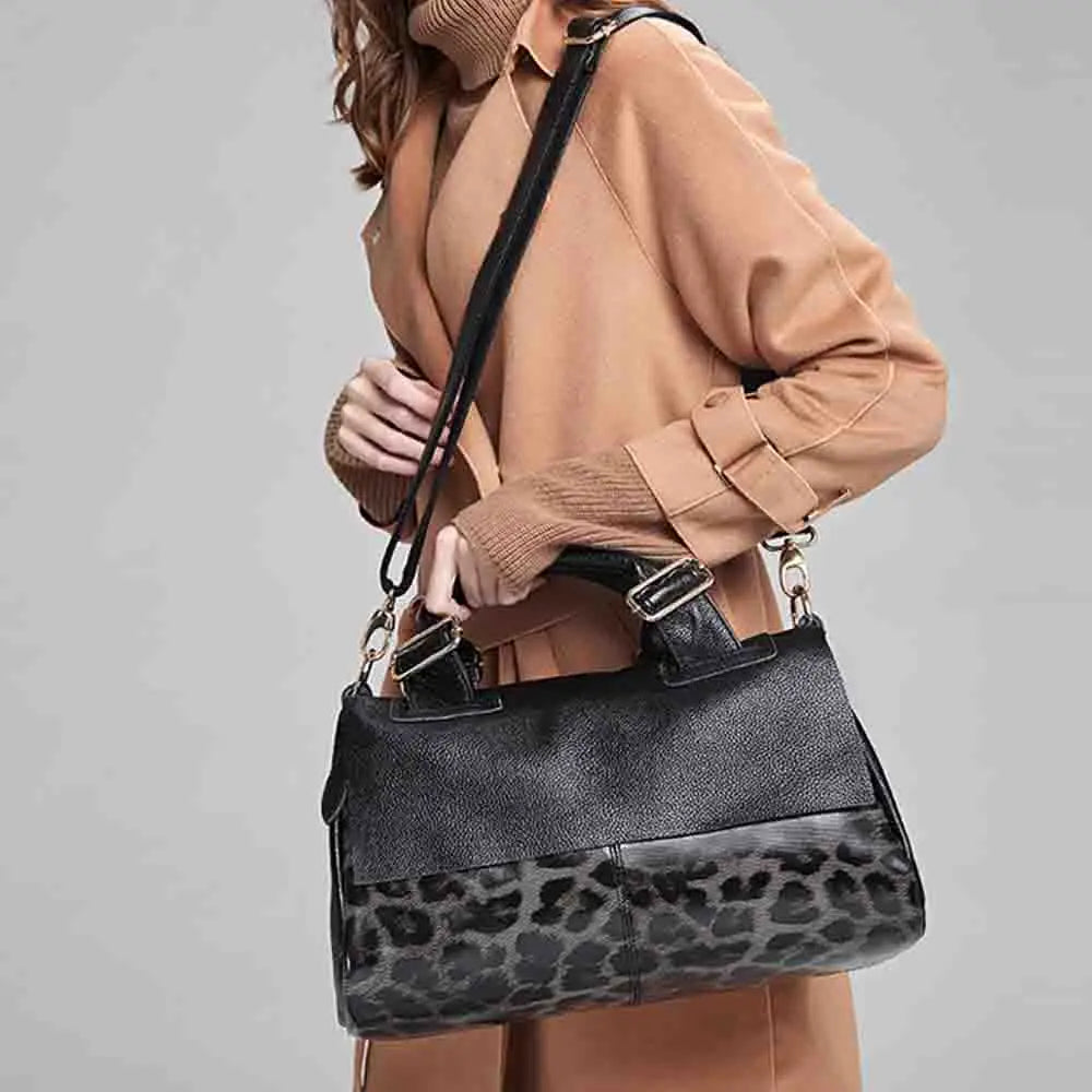 model using leopard leather handbag