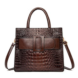 brown crocodile leather handbag