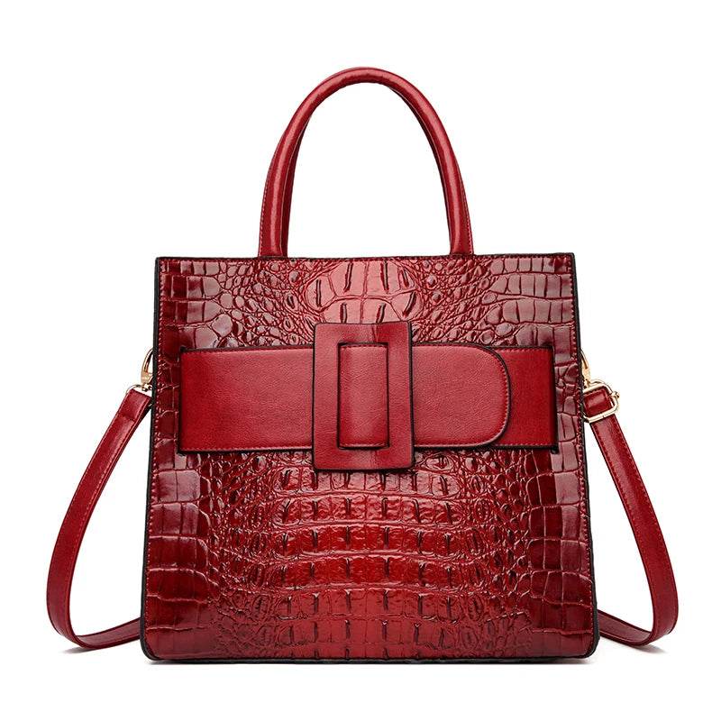 red crocodile leather handbag