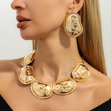 Model Using Luxury Exaggerated Punk Geometric Torques Jewelry Set