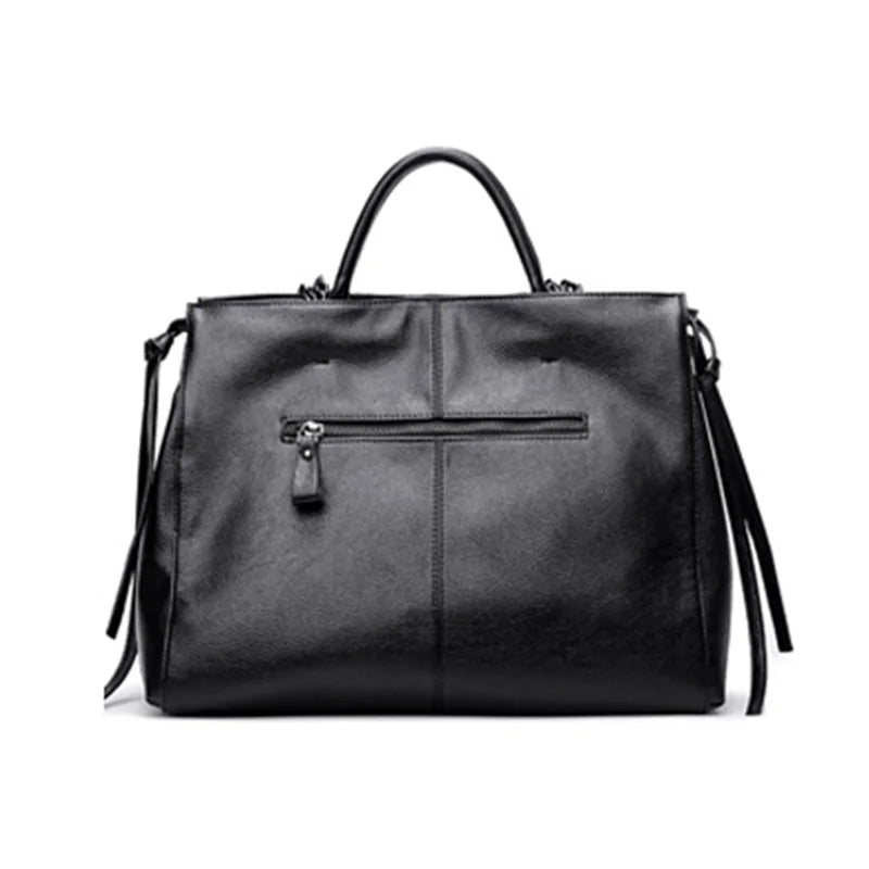Back view of black crocodile handbag 
