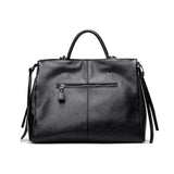 Back view of black crocodile handbag 