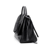 side view of crocodile handbag 