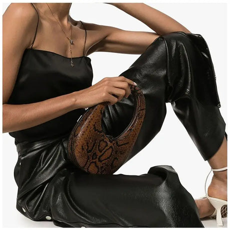 model using Luxury Oval Snake Bag For Women