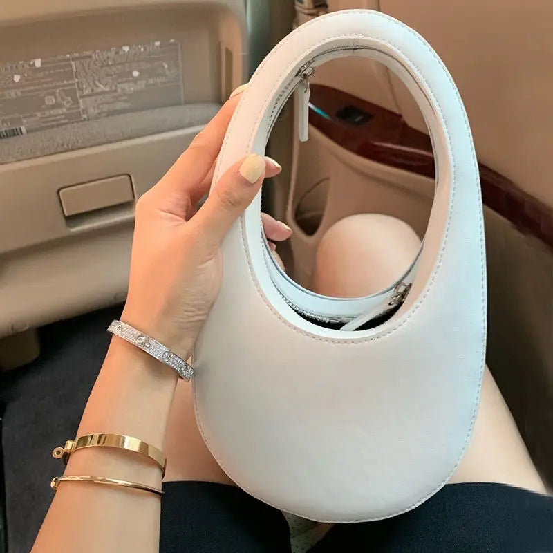 mode holding Luxury Oval Snake Bag For Women