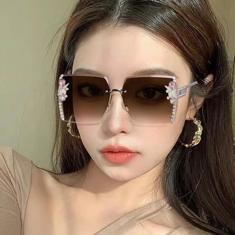 Model Using Luxury Oversized Square Rimless Sunglasses