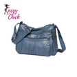 blue leather handbag sassy chick logo