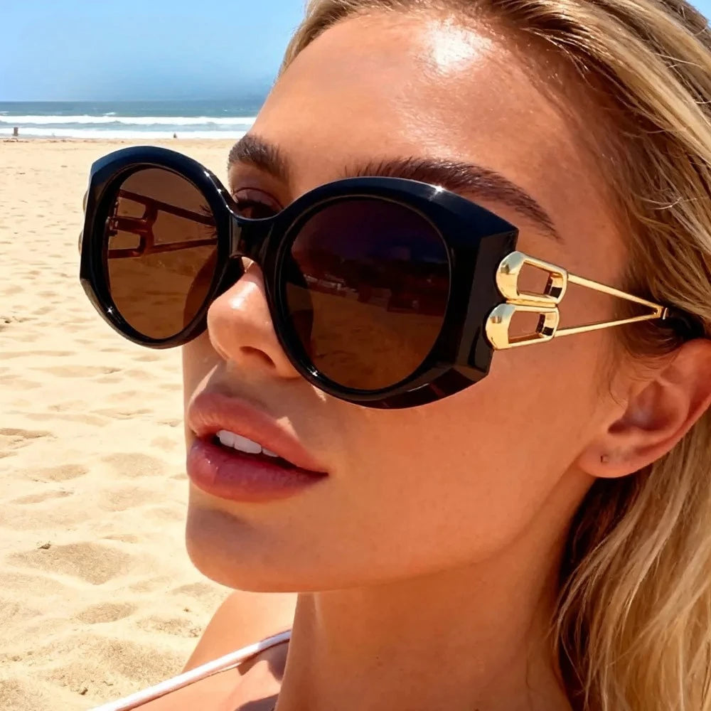 Model Using Oversize Square Hollow Cat Eye Sunglasses