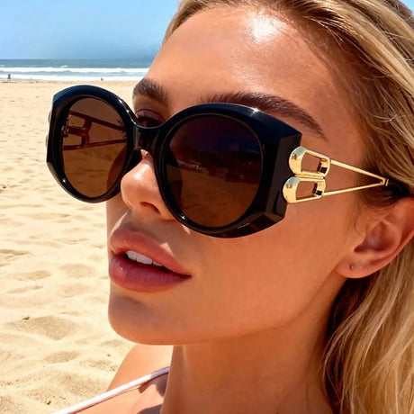 Model Using Oversize Square Hollow Cat Eye Sunglasses