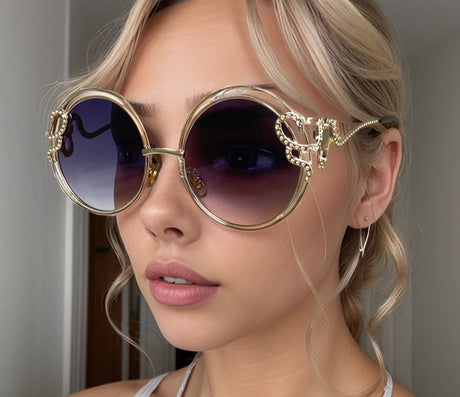 model using Oversized Round Sunglasses