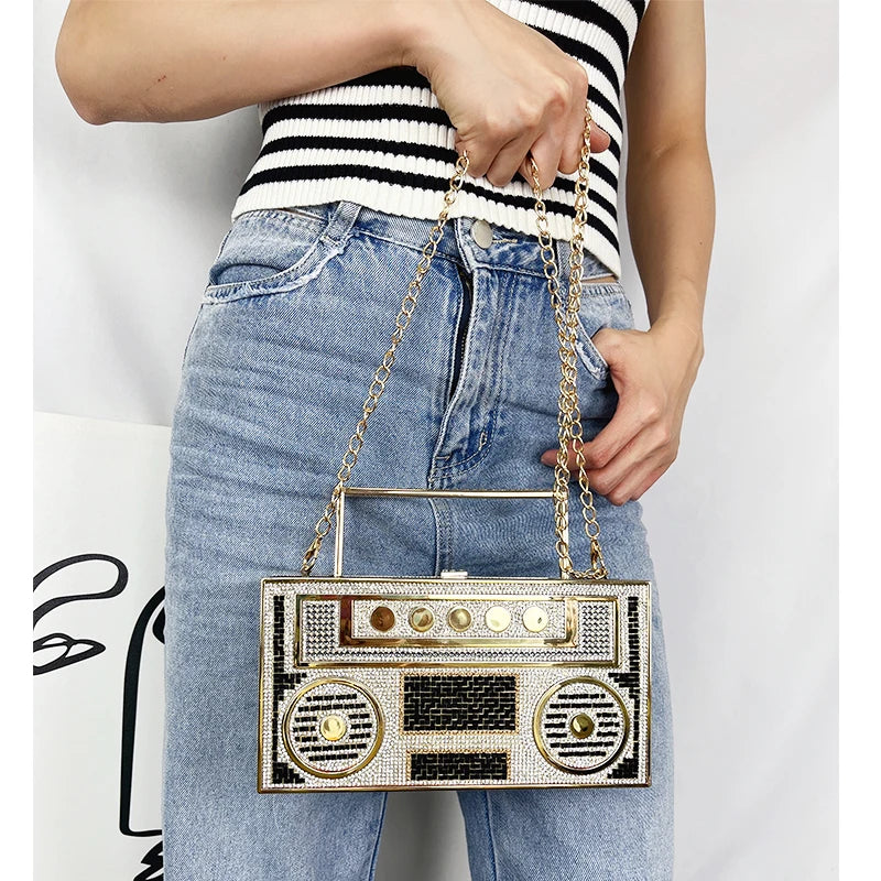 Model using Radio Shape Metal Handle Evening Clutch Bag