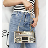 Model using Radio Shape Metal Handle Evening Clutch Bag