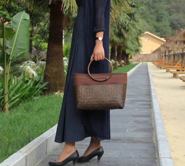 Model using Rattan Weave Wooden Handbag