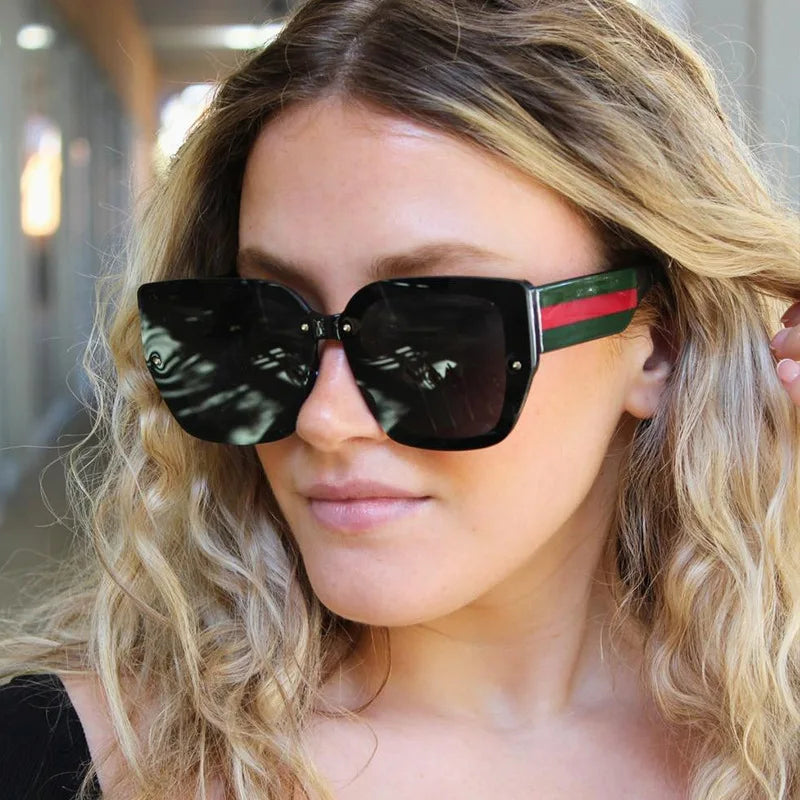 Model Using Retro Polygonal  UV400 Sunglasses