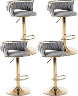 Set of 4 modern velvet swivel bar stools with low back and adjustable height on golden base