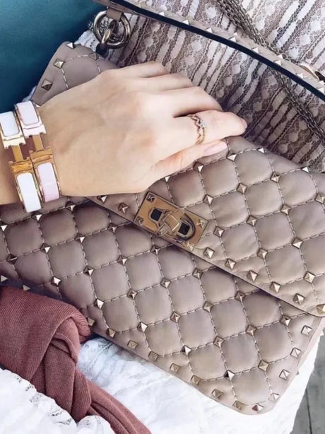 Holding Sheepskin Chain Rivet Handbag