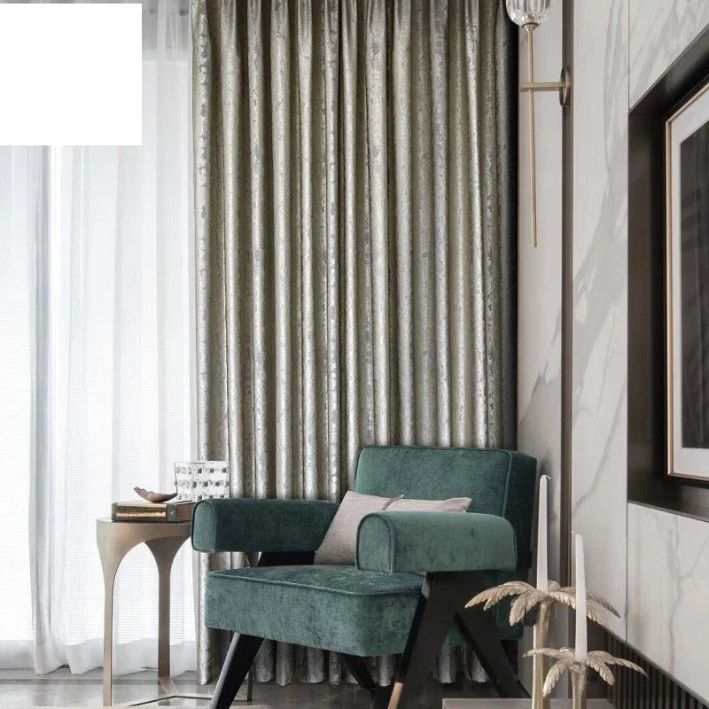 Silver jacquard luxury blackout curtains hanging in a modern living room