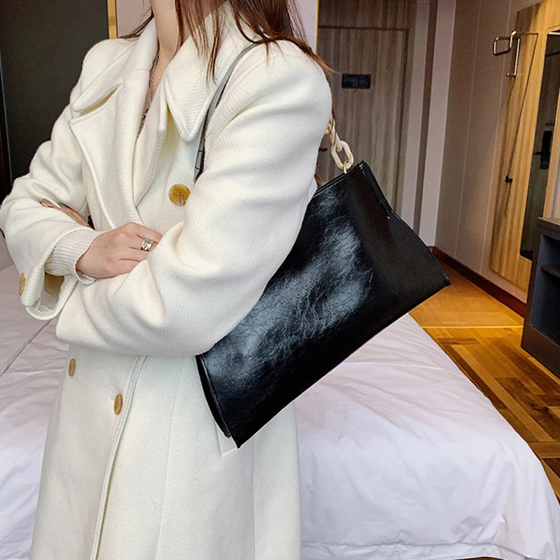 model using black handbag