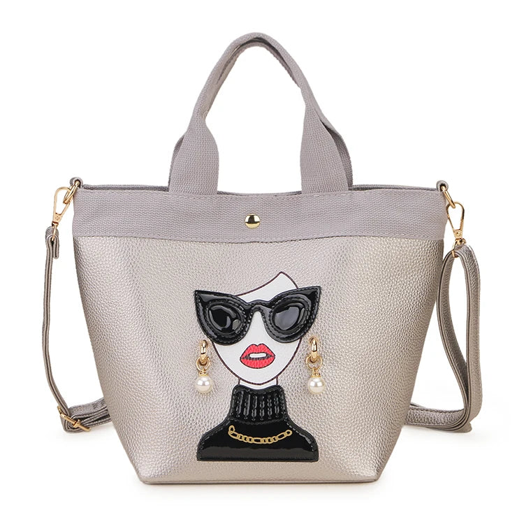 silver woman face design handbag