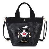 black woman face design handbag