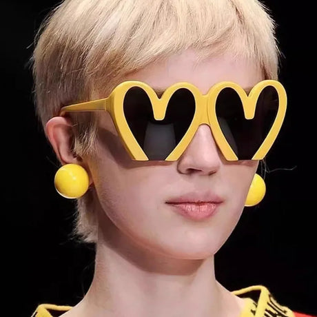 Model using Vintage Heart Core Sunglasses