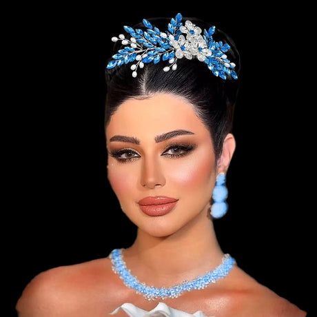 bride using blue rhinestone hair piece 