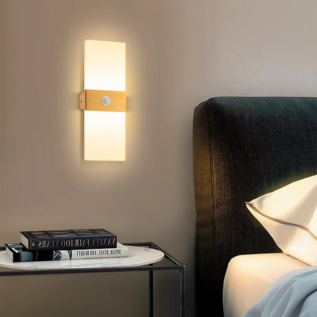 LED wall light with PIR motion sensor mounted in a bedroom or hallway