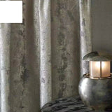 Silver jacquard luxury blackout curtains hanging in a modern living room