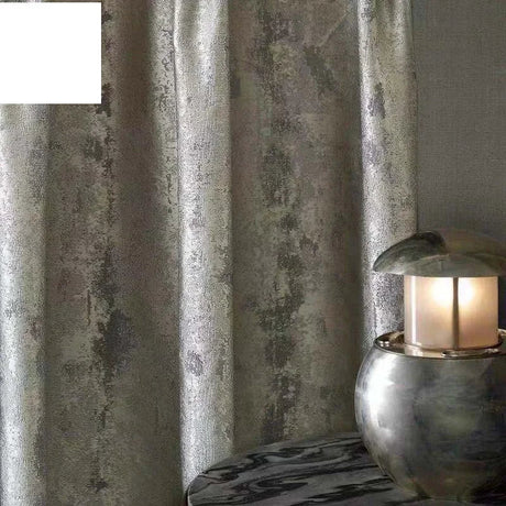 Silver jacquard luxury blackout curtains hanging in a modern living room