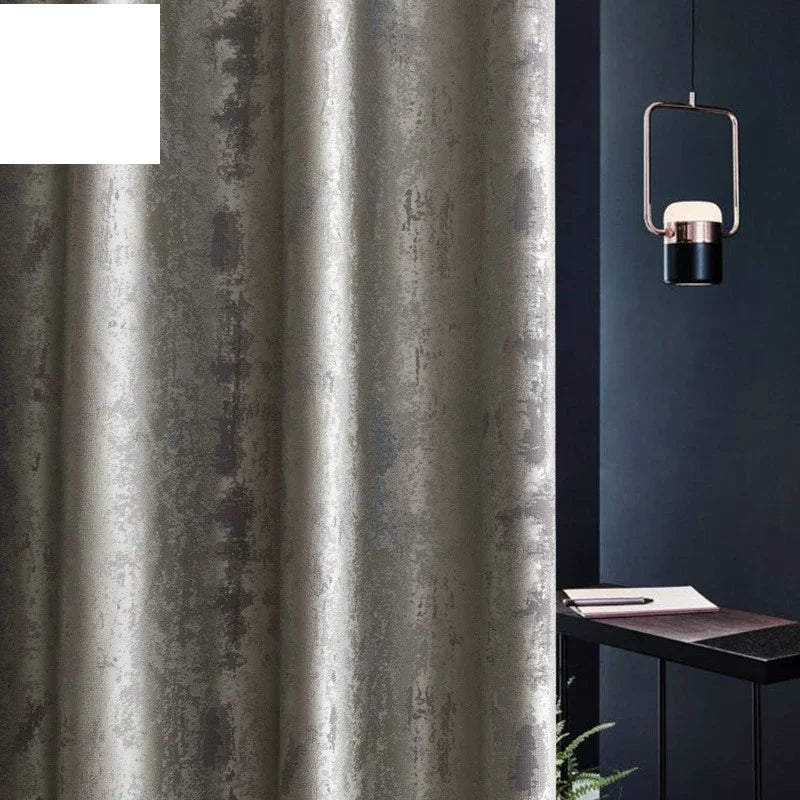 Silver jacquard luxury blackout curtains hanging in a modern living room