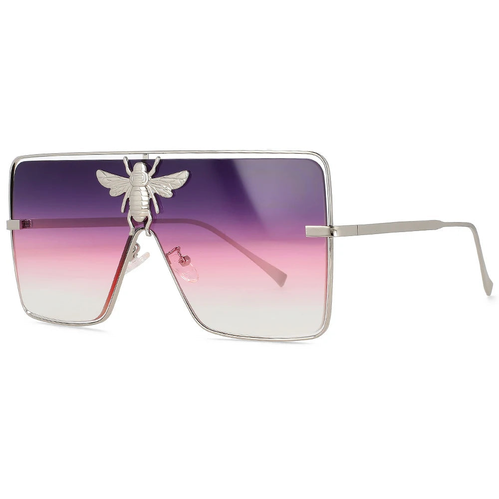 Luxury square metal sunglasses with UV400 protection and bold fashion frame for women.