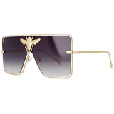 Luxury square metal sunglasses with UV400 protection and bold fashion frame for women.
