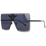 Luxury square metal sunglasses with UV400 protection and bold fashion frame for women.