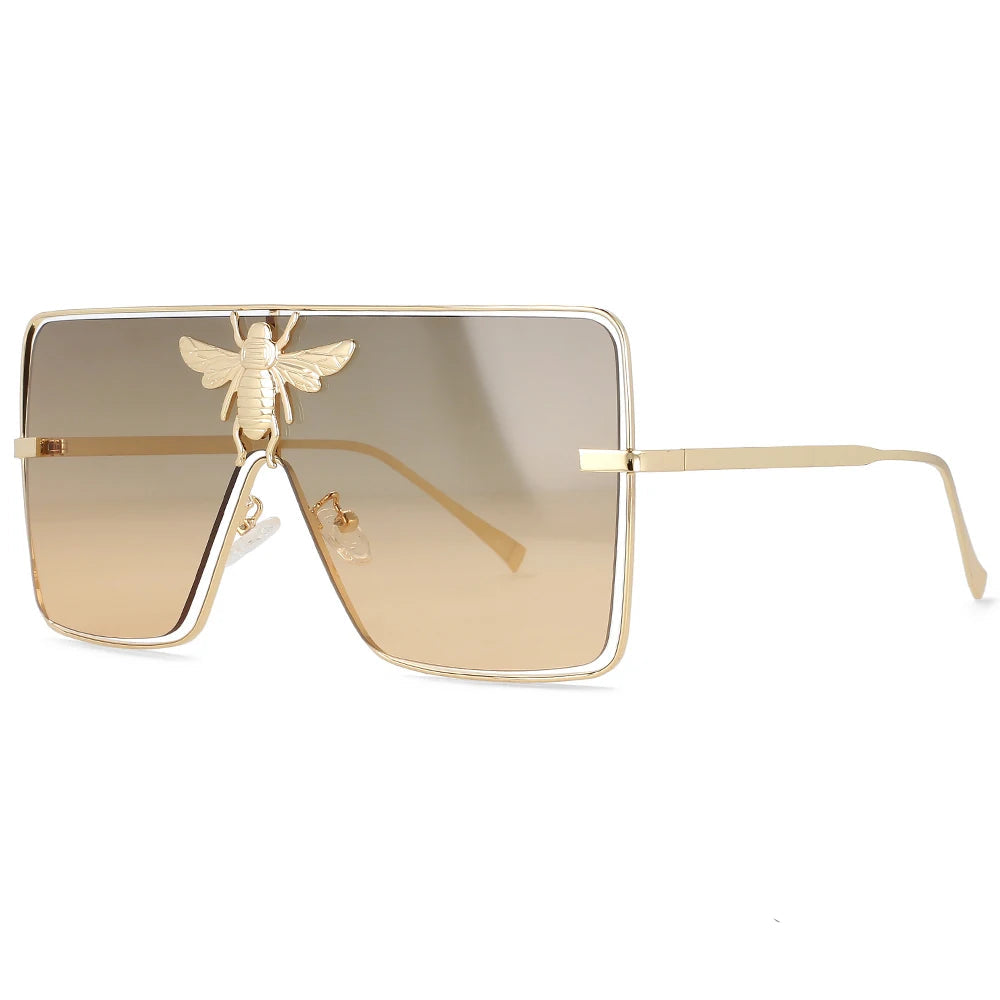 Luxury square metal sunglasses with UV400 protection and bold fashion frame for women.