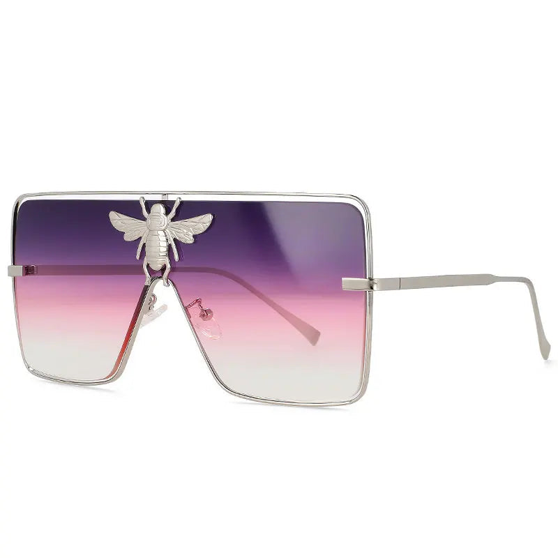 Luxury square metal sunglasses with UV400 protection and bold fashion frame for women.