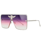 Luxury square metal sunglasses with UV400 protection and bold fashion frame for women.